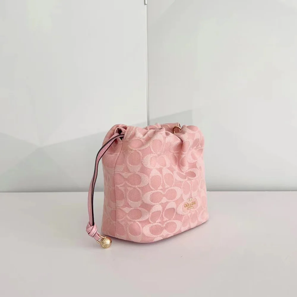 Coach Pink Signature Jacquard Mini Bucket Drawstring Crossbody Bag